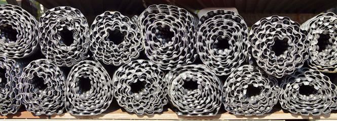 panoramic image of many Rolls of industry Dimple Drainage Board. dimple board. External sealing of...