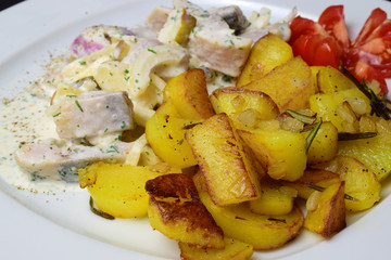 Heringsstip mit Bratkartoffeln