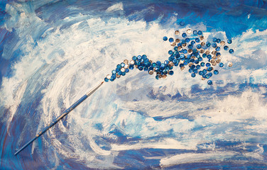 Fototapeta premium paint and brashes on the background of a painting