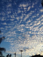 blue sky ocm white clouds during a sunny day