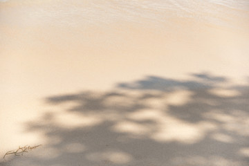 Sandy beach with shadow at daytime