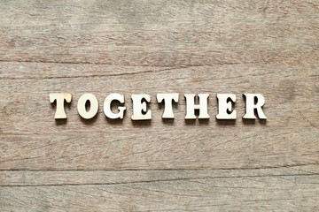 Letter block in word together on wood background