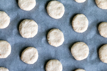 raw dough for cookies ready for baking. food pattern, home cooking concept