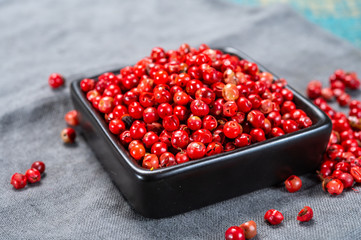 Bowl with dried red round peppers condiment