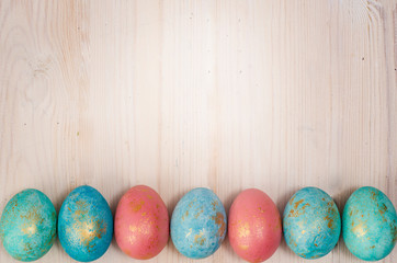 easter background template. Easter eggs put on wooden in white wood wall.
