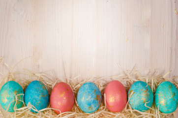 easter background template. Easter eggs put on wooden in white wood wall.