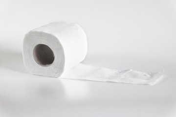 Roll of toilet papers on a soft color background.