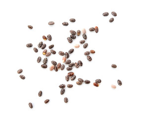 Closeup macro of small organic chia seeds isolated on a white background