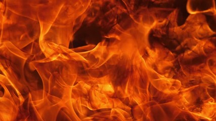 Slow motion speed close up scene of moving burning pattern as background. hot as inferno flame concept, abstract beautiful fire texture with flakes of spark, black smoke from petroleum oil ignition - Powered by Adobe