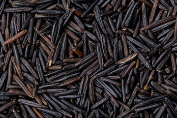 Wild rice. Rice texture macro. Natural rice background and texture