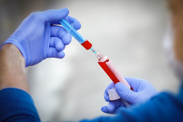 a Coronavirus blood test in a man's hands 2019-2020. Crown virus outbreak. Epidemic viral respiratory syndrome. China