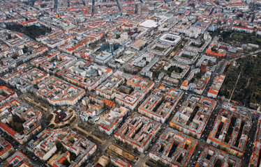 aerial photo of houses in big city - obrazy, fototapety, plakaty