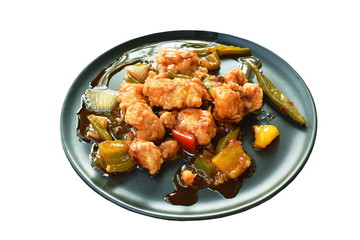 fried crispy chicken with slice bell pepper in sweet sauce on dish
