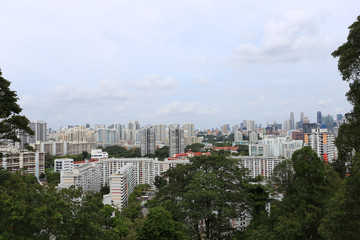 Cityscape of Condominium building complex with Warehouse import-export and Green forest park in singapore, City area