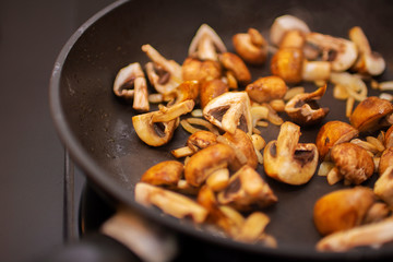 Fried mushrooms in a frying pan