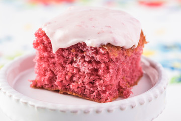Homemade strawberry sheetcake with strawberry frosting.