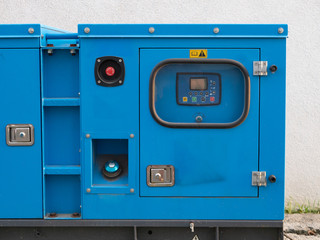 industrial diesel power generator electrical equipment. close-up of control panel with display and buttons