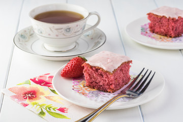 Homemade strawberry sheetcake with strawberry frosting.