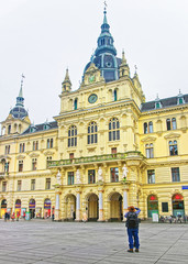 Fototapeta na wymiar Graz Town Hall and a photographer in Graz of Austria