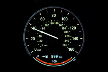 60 Kilometers per hour,light with car mileage with black background,number of speed,Odometer of car.	