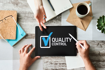 Quality control check box on device screen. Standards and certification, assurance, guarantee....