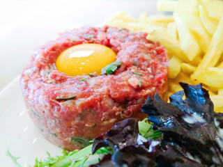 tasty Steak tartare (Raw beef) - classic steak tartare on white plate