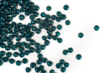 close up multi colored beads heap isolated on white