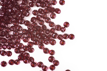 close up multi colored beads heap isolated on white