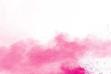 Pink color powder explosion on white background.