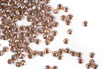 close up multi colored beads heap isolated on white