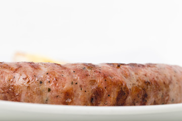 Fragmnet of the breakfast with the sausage.