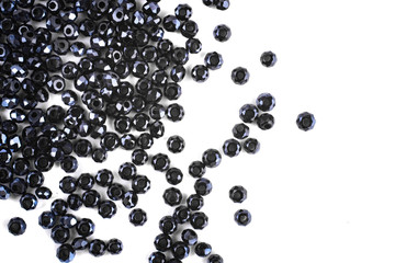 close up multi colored beads heap isolated on white