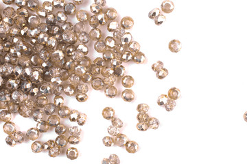 close up multi colored beads heap isolated on white