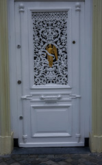 white door with golden angel