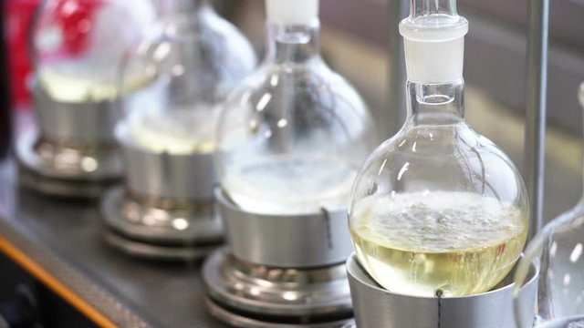 Soxhlet Extractor.Percolator-boiler and reflux,distillation flask on heating element.Organic chemistry class.Pharmacy Extraction.