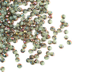 close up multi colored beads heap isolated on white