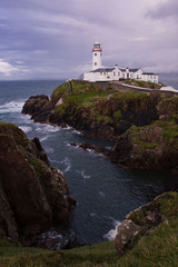 Fototapeta na wymiar Leuchtturm am Wild Atlantic Way in Irland