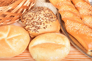 various fresh crispy baked buns with seeds