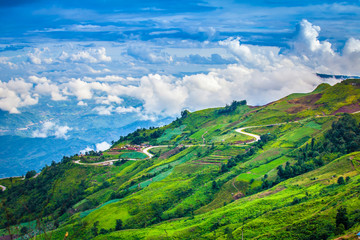 Beautiful scenery, clouds and road to Phu Thap Boek mountain in the rainy season, Phetchabun Province,Thailand