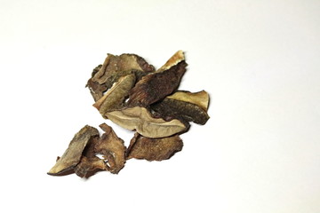 Pile of dried mushrooms on white background