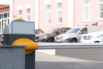 Automatic security metal barrier boom closed for stop and checking car entering to restricted area