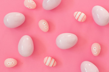 Easter composition. Pink eggs background.