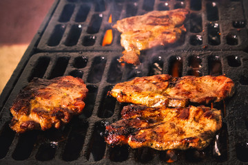 Pork steaks on the grill. Serbian barbecue.