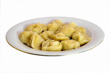 Meat dumplings, russian pelmeni, ravioli with meat on a plate on a white background, isolated.