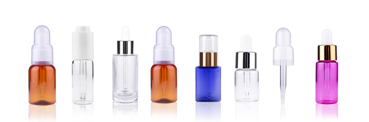 bottles with essential oils isolated on white background