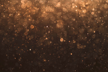 Golden abstract brown bokeh color background.
