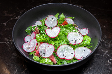 vegetable salad with radishes and tomatoes