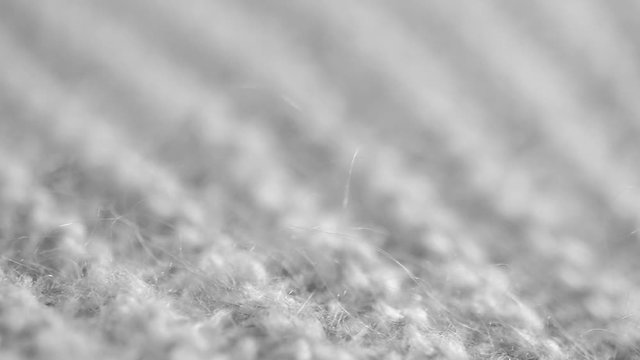 Cheap, polyester clothing  material close up macro slider shot.