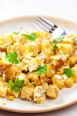 fried dumplings with fried eggs