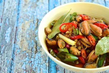 Oseng Kerang Saus Tiram, Indonesian food. Stir-fried mussels with oyster sauce, soy sauce, lemongrass, bayleaf, ginger, garlic and chili.